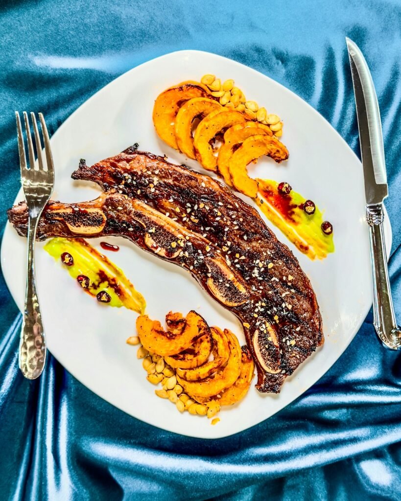 Short Ribs on a plate with delicata squash