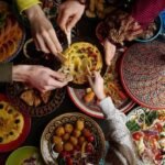 people enjoying kebabs